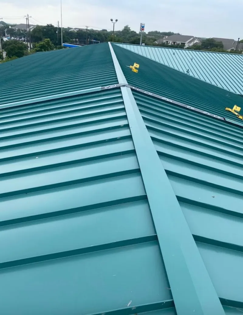Green commercial metal roof ridge and valley for Metal Roof Repair in Ensley