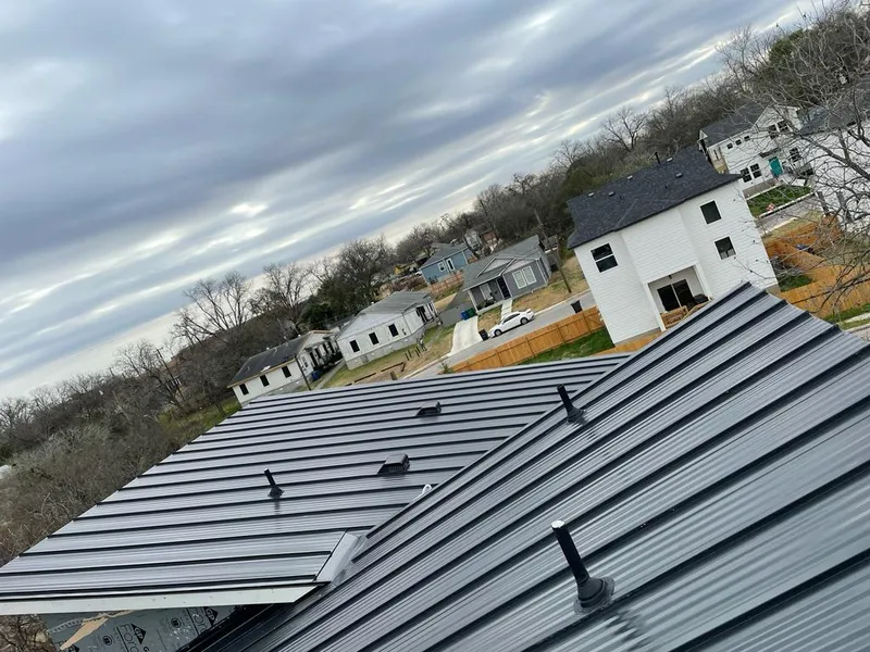 Standing seam metal roof panels with vents for Skylight Repair in Ensley